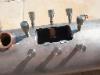 A good shot showing how the bolts, nuts and the retaining plate arrangement works. 