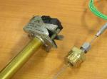 Old thermostat left, new thermocouple right.